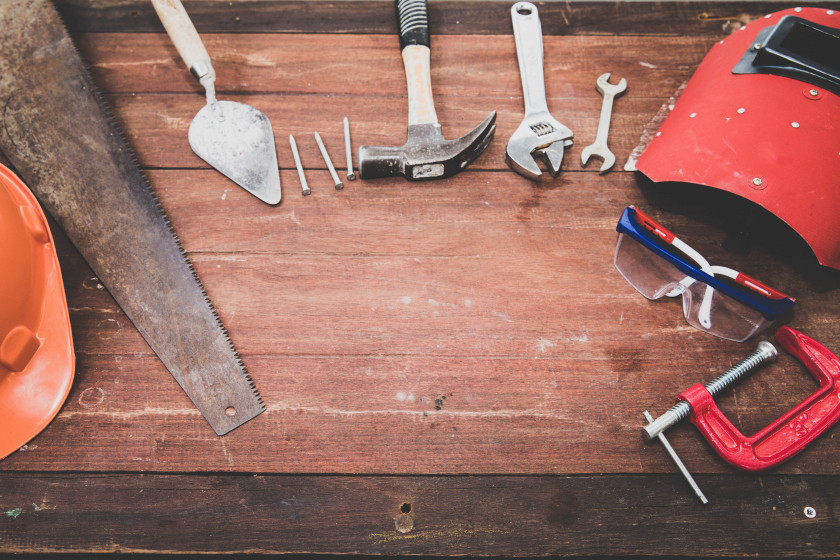 Carpenter tools arranged on a board